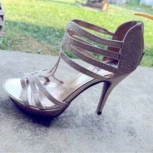 Brash metallic gold strappy platform heels